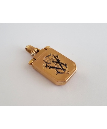 Złoty medalion - sekretnik z lat 20-tych XX wieku, zdobiony emalią oraz tygrysim okiem