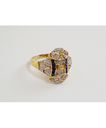 Złoty pierścionek zdobiony diamentami - próba 750